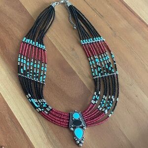 Elegant Beaded Necklace with Turquoise and Red Accents
